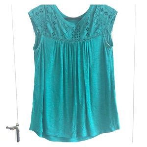Green crochet neckline top.